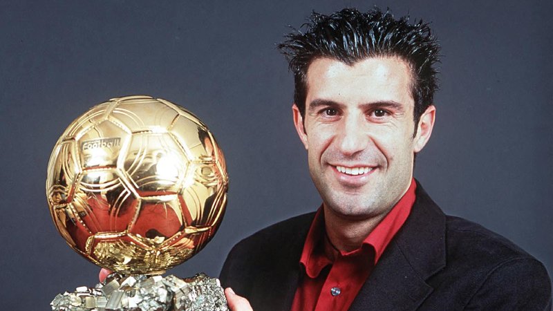 A picture released 13 December 2000 shows Portugal and Real Madrid star Luis Figo, the most expensive player in the world, posing with his  prestigious 2000 Ballon d'Or awarded by France Football magazine. AFP PHOTO ALAIN MARTIGNAC (Photo by ALAIN DE MARTIGNAC / FRANCE FOOTBALL / AFP) (Photo by ALAIN DE MARTIGNAC/FRANCE FOOTBALL/AFP via Getty Images)